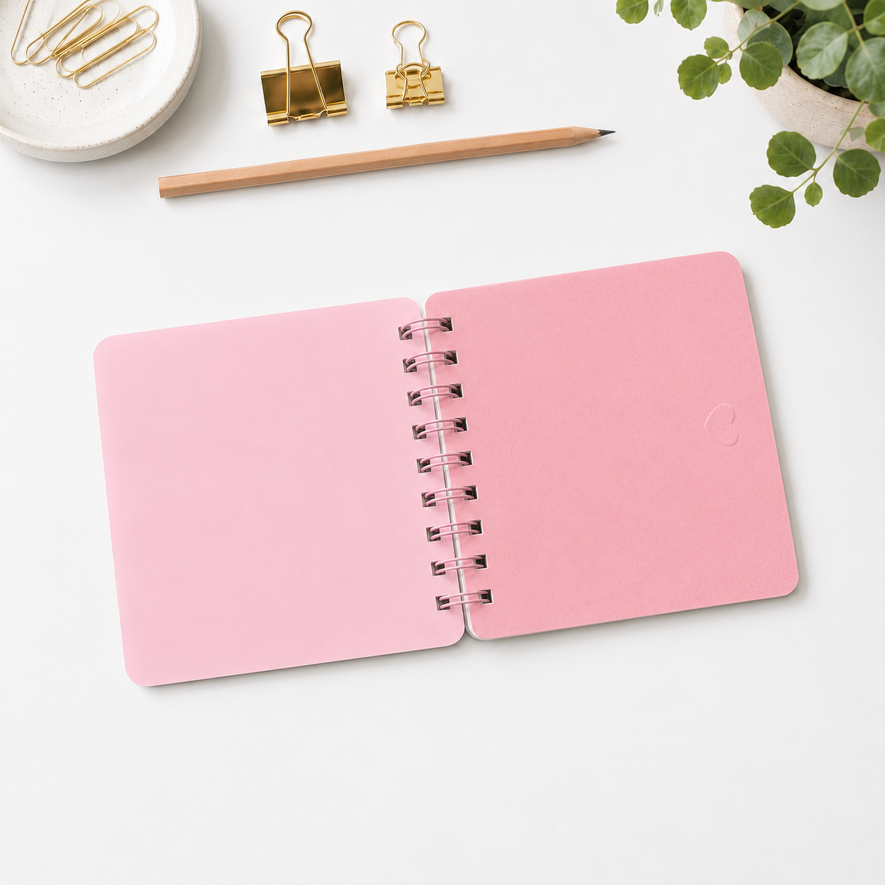 Libreta Flor en mano