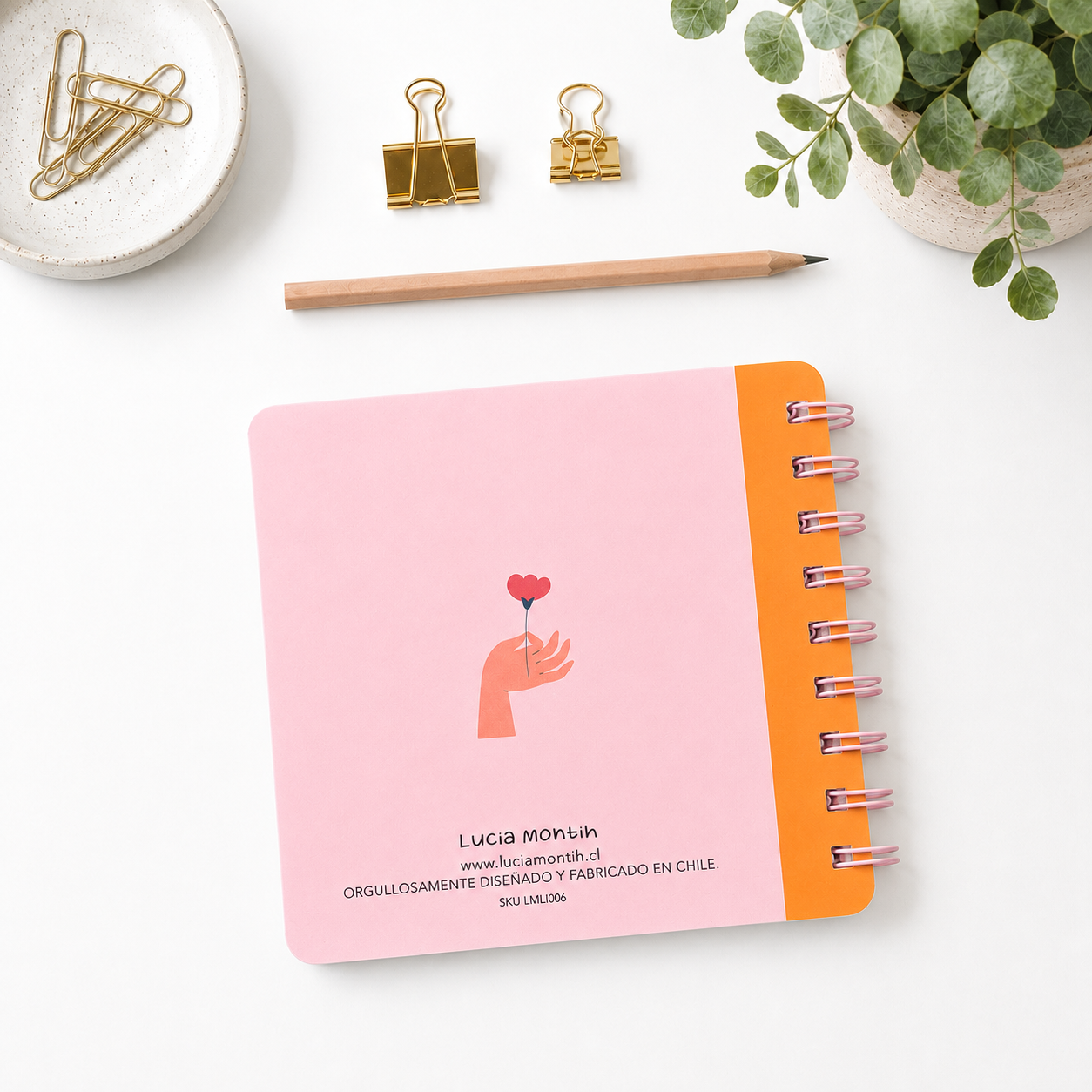 Libreta Flor en mano