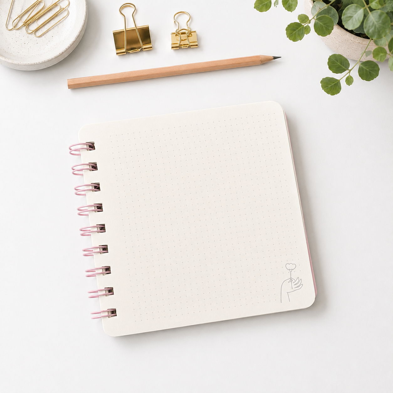 Libreta Flor en mano